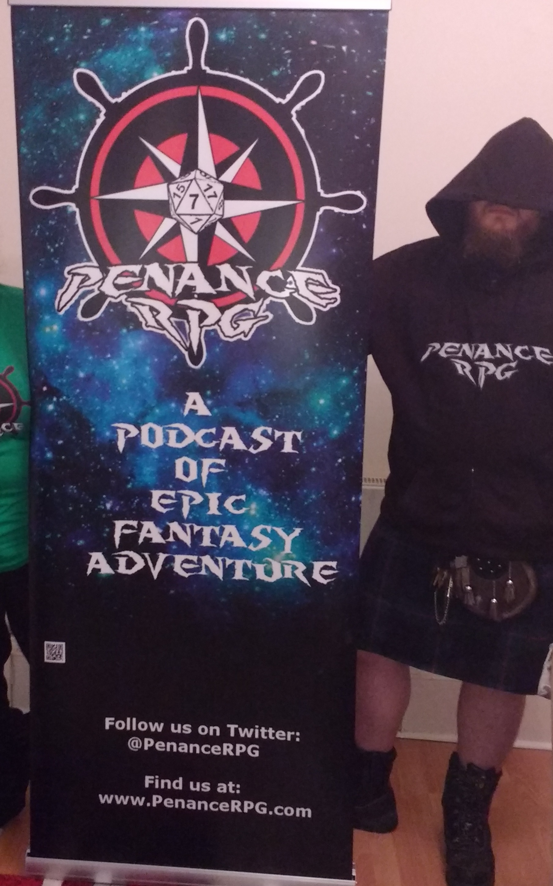 Dragonmeet banner, featuring Nikoli for scale